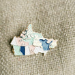 Load image into Gallery viewer, Proudly display our Canada pin! They're perfect on backpacks, bulletin boards, jackets, hats and lanyards. Our pins come with a rubber clasp for ultimate comfort against your skin.