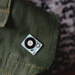 Load image into Gallery viewer, This seafoam green turntable pin measures 1 1/4" along the longest edge.