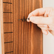 Load image into Gallery viewer, Easily keep track of multiple children's measurements by using different colors. Available in black, white, pink, and blue.