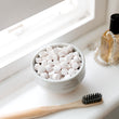 Load image into Gallery viewer, Simply pop a tablet into your mouth, give it a couple of chews, and brush with a wet toothbrush. It’s essential not to swallow the tablet.