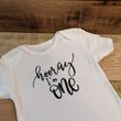Load image into Gallery viewer, Hooray I'm One Onesie - All Decked Out Events