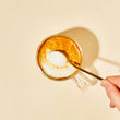 Load image into Gallery viewer, Turmeric Tea Latte made using the Blume turmeric blend.