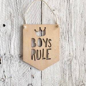 Laser engraved wall flag with a crown that says "Boys rule"