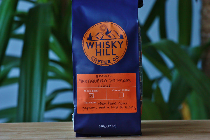 Whiskey Hill Coffee Co. light roast whole bean coffee made with Brazilian beans.
