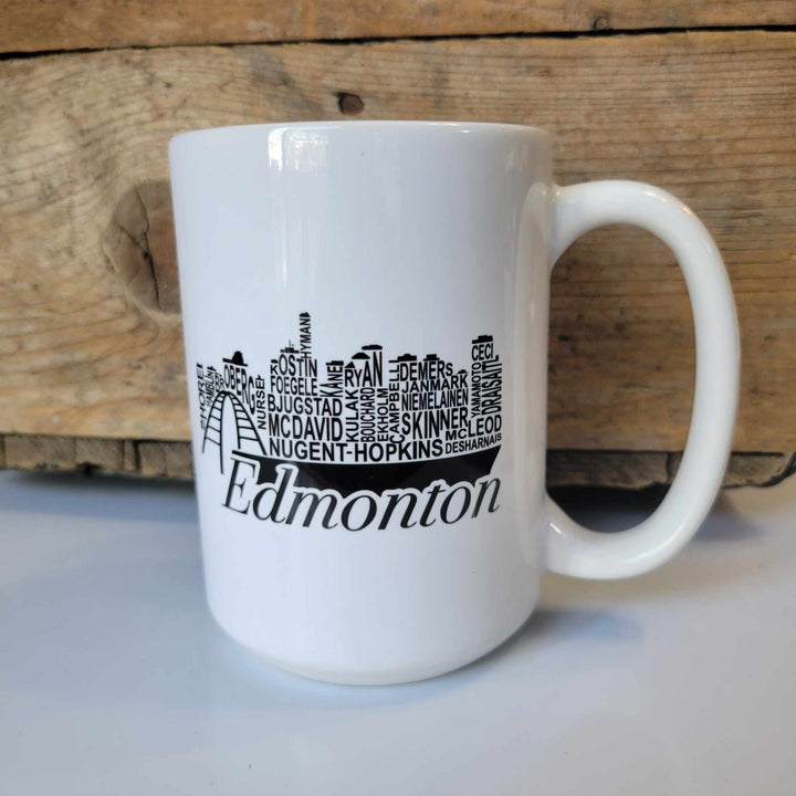 15oz ceramic mug with the Edmonton landscape made out the the last names of the 2022/2023 Oilers roster in black. The mug is dishwasher safe but handwash is recommended