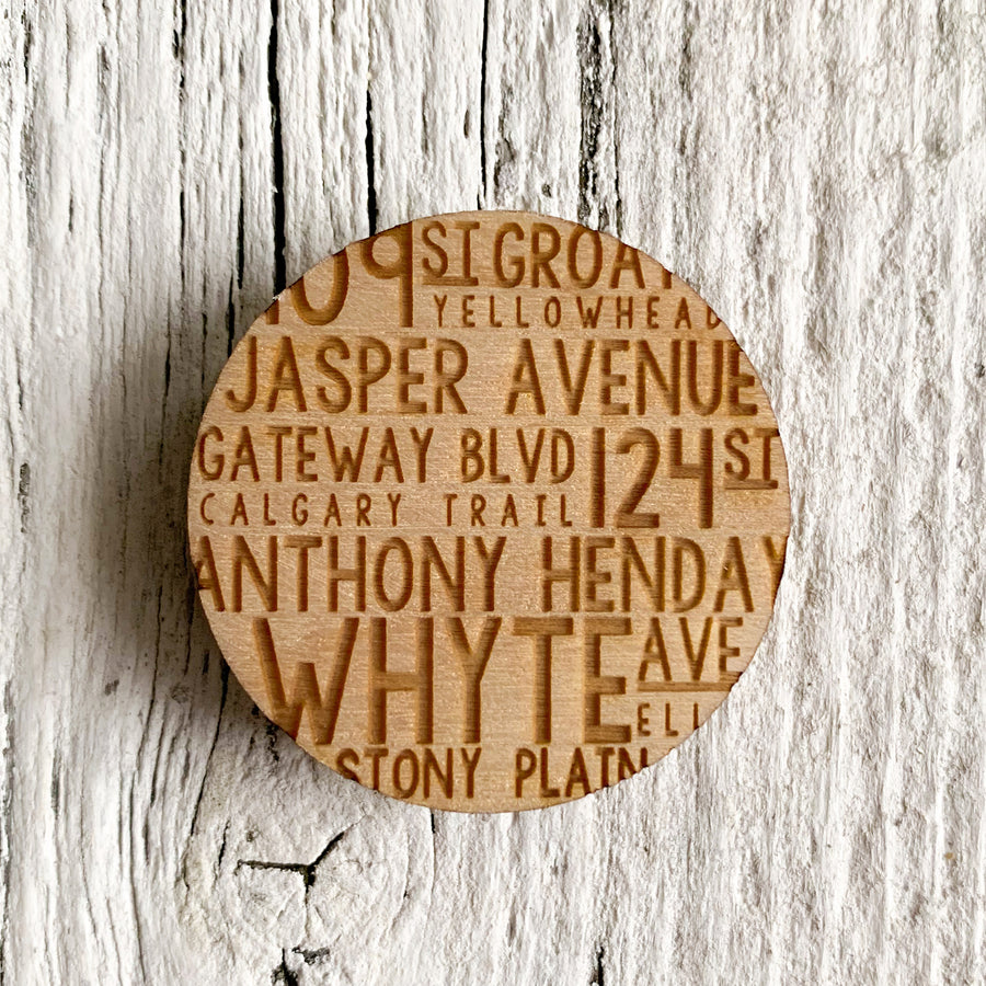 2 inch birch plywood laser engraved magnet with Edmonton road names.