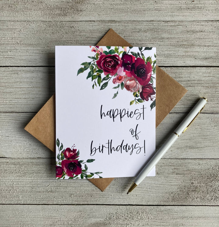 Floral birthday card that says "happiest of birthdays!", 10% of proceeds donated to Canadian charities assisting families coping with miscarriage and loss, the inside is blank