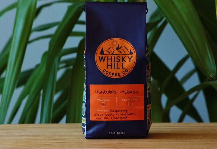Whiskey Hill Coffee Co. medium blend whole bean coffee using Honduras beans.