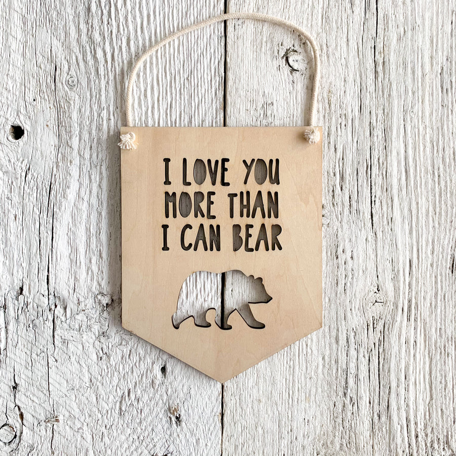 Laser engraved wall flag with a bear that says "I love you more than I can bear".
