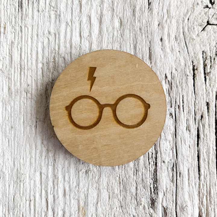 2 inch birch plywood magnet with the Harry Potter glasses and lightning bolt scar.