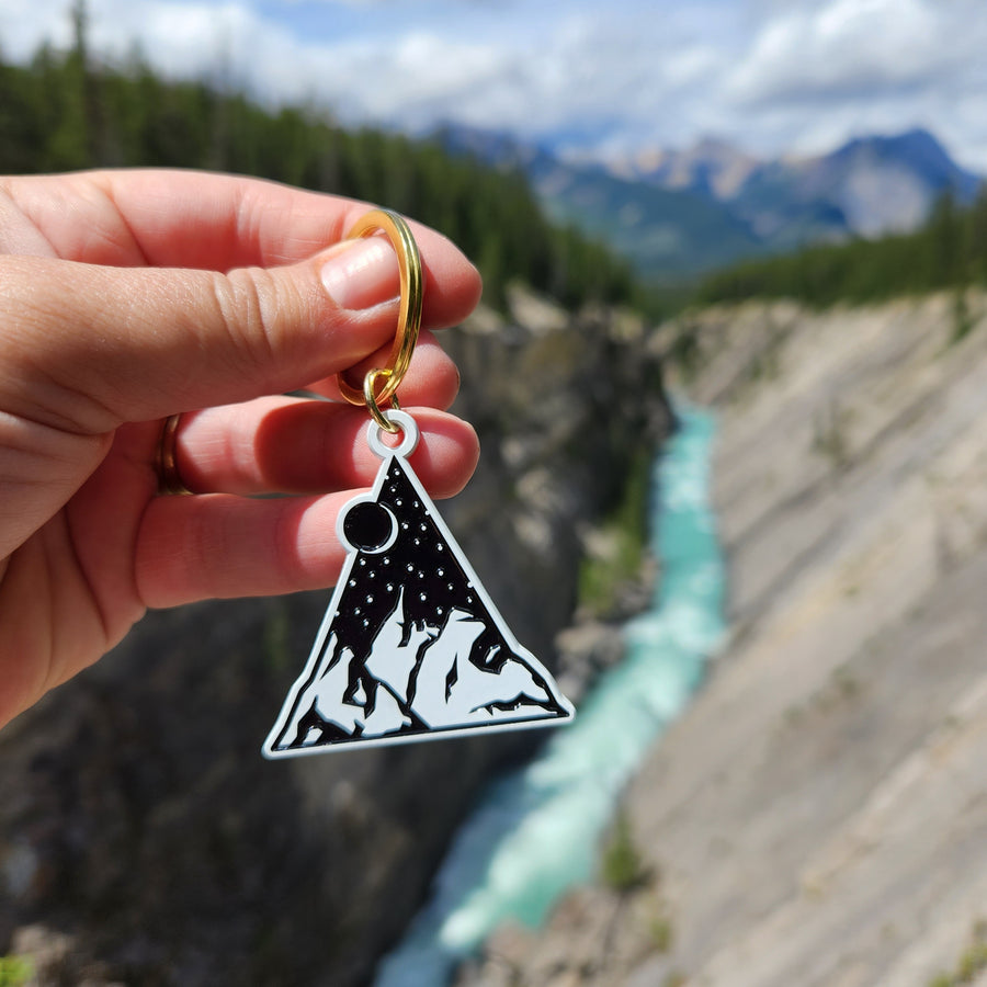 Each mountain pendant measures 1.75" on the longest/widest edge. Additionally is the keyring and one jump ring.