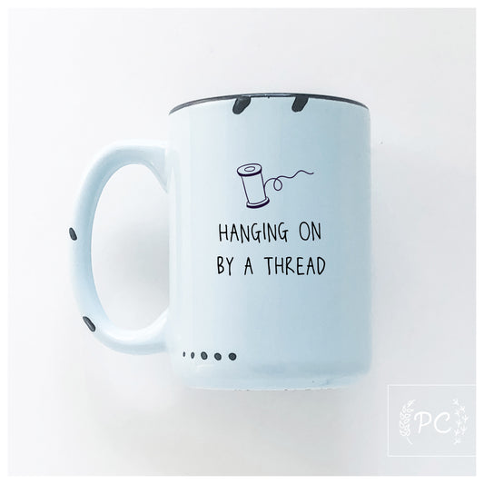 Hanging On By A Thread Mug