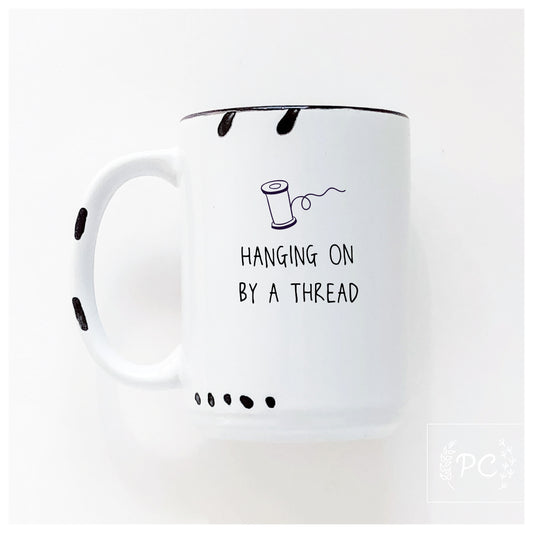 Hanging On By A Thread Mug
