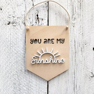 Laser engraved 3D wall flag that says "you are my sunshine"