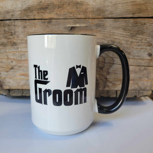 15oz ceramic mug that says "The Groom" in The Godfather font. Mug is dishwasher safe but handwash is recommended
