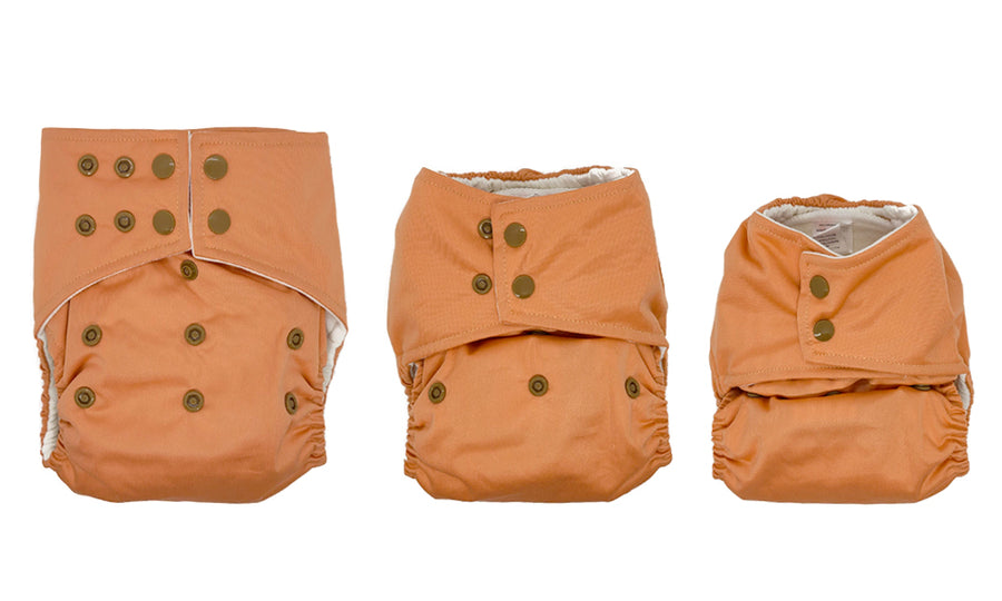 These diapers grow with your baby, from approximately 10lbs until potty trained. They are made with bamboo and hemp cotton, which are the most absorbent fibers. They come with an extra liner, and a bamboo velour liner that is extremely soft against your baby's skin.