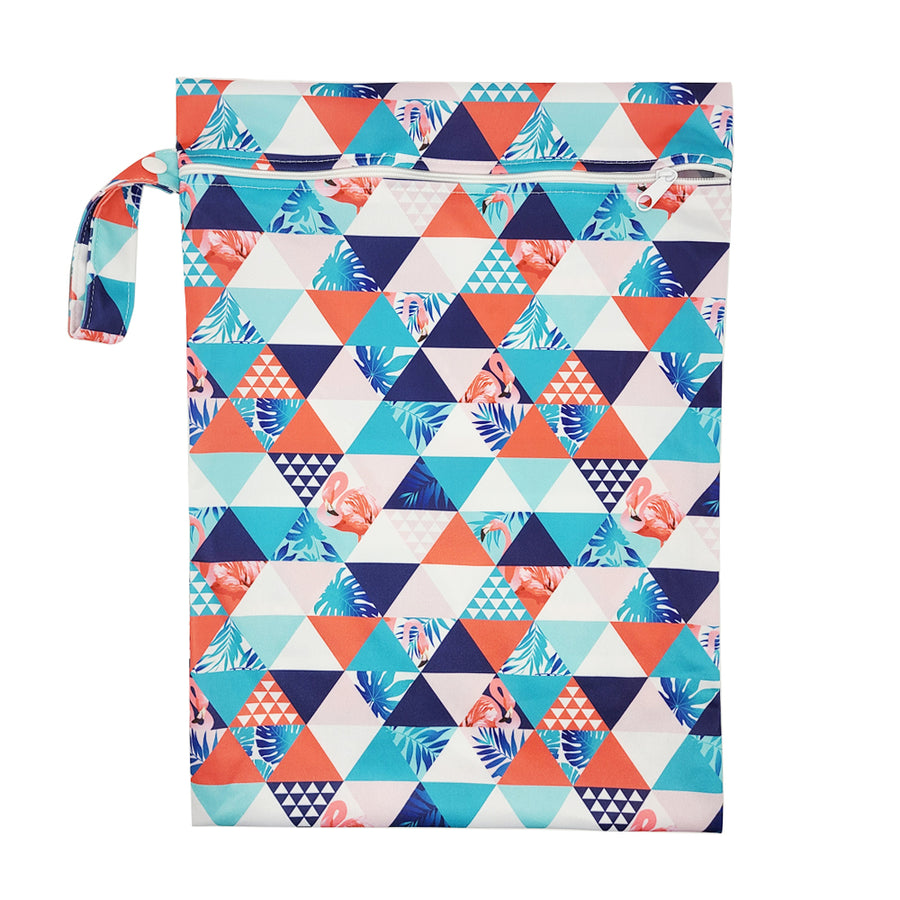 These bags are for storing dirty diapers until laundry day. They go right into the washing machine with the diapers. Wet Bag in "Flamingo" with blue and orange geometric designs and flamingos