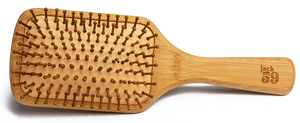 Jack59's sustainable bamboo hair brush has smooth, rounded bamboo bristles to massage and stimulate the scalp and a natural rubber base for added cushion. Our bamboo brushes are 100% plastic free, vegan, and biodegradable. We have chosen this bamboo paddle brush for its large surface area to help reduce breakage and increase blood flow to your scalp, gently stimulating with every stroke. 