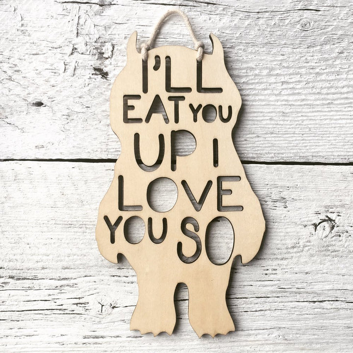 Laser engraved monster shaped wall flag that says "I'll eat you up I love you so".