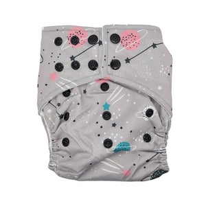 cloth diaper in "space cadet" with a grey back ground with pink, blue , and white planets and black, pink, blue, and white stars with black buttons