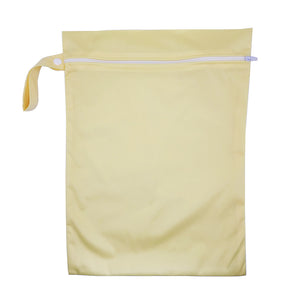 These bags are for storing dirty diapers until laundry day. They go right into the washing machine with the diapers. Wet Bag in "Vanilla butter" yellow