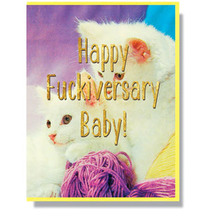 This A2 (4.25” x 5.5”) anniversary card is digitally printed, blank on the inside, and comes with a yellow envelope. The front of the card has two cats and says "Happy Fuckiversary Baby" in gold lettering