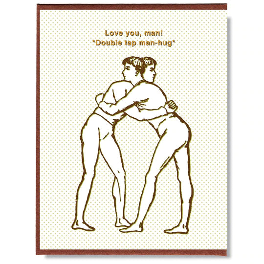 This A2 size (4.25” x 5.5”) card is digitally printed and gold foil stamped, it is blank inside and comes with a recycled envelope. The front of the card has two men hugging and says "Love you man! *Double tap man-hug*" in gold lettering.
