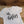Load image into Gallery viewer, white newborn diaper shirt that says &quot;oh baby&quot; in black script made by All Decked Out Events in Sherwood Park Alberta
