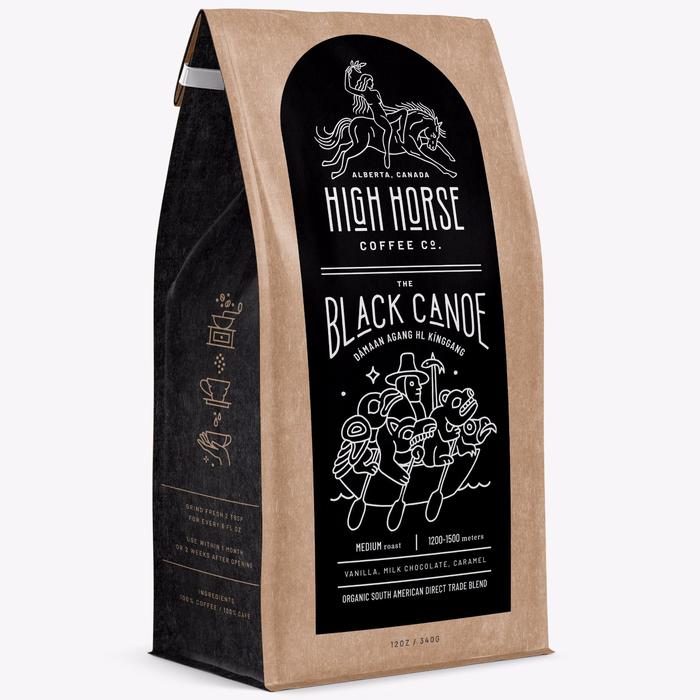 High Horse Coffee Co. Black Canoe medium roast whole bean coffee with tasting notes of vanilla, milk chocolate, and caramel.