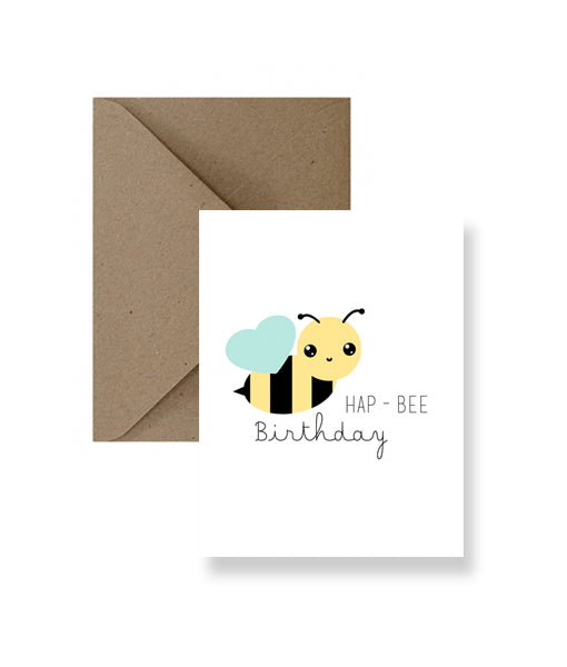 Sized A2, 4.25 x 5.5 inches folded card with a cute bumble bee on the front and says "Hap-bee Birthday". The card comes with a matching Kraft Envelope