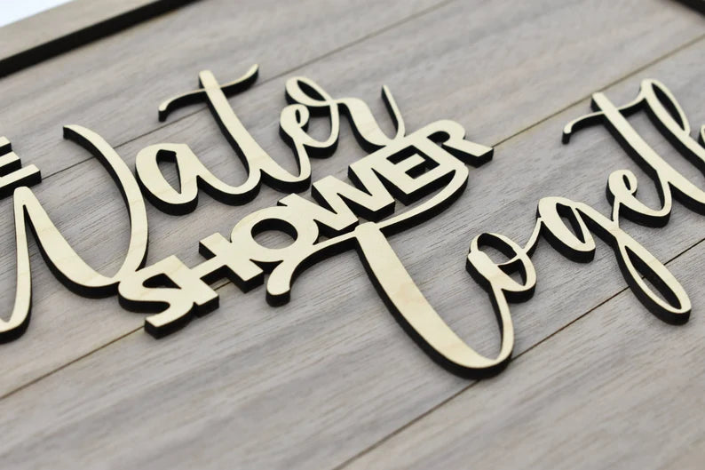 Beautiful and funny wooden decor sign made of high-quality plywood with the text "Save Water Shower Together". The sign is carefully crafted using a walnut background nicely finished with a walnut frame, and raised script lettering that is laser cut in maple. A mounting hole is provided for quick and easy installation.